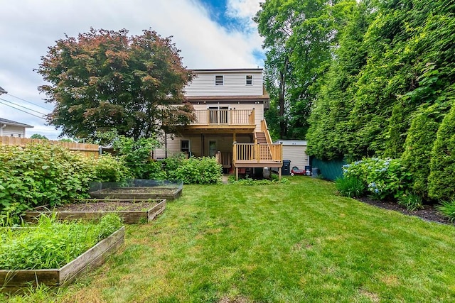 15 N St, Warwick, RI 02886 - back of house with a garden, stairway, and a wooden deck