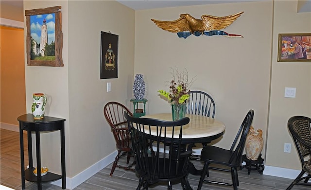 2352 Matunuck Schoolhouse Rd, Charlestown, RI 02813 - dining area with wood finished floors