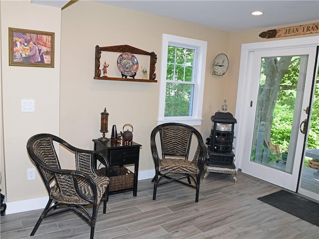 2352 Matunuck Schoolhouse Rd, Charlestown, RI 02813 - living area with healthy amount of natural light, wood finished floors, and recessed lighting