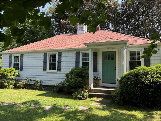2352 Matunuck Schoolhouse Rd, Charlestown, RI 02813 - view of front of house with a chimney and a front yard