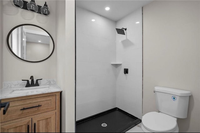 137 Stanwood St, Providence, RI 02907 - bathroom featuring vanity, a tile shower, and recessed lighting