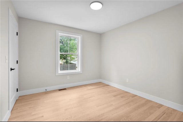 137 Stanwood St, Providence, RI 02907 - spare room with light wood-type flooring and baseboards