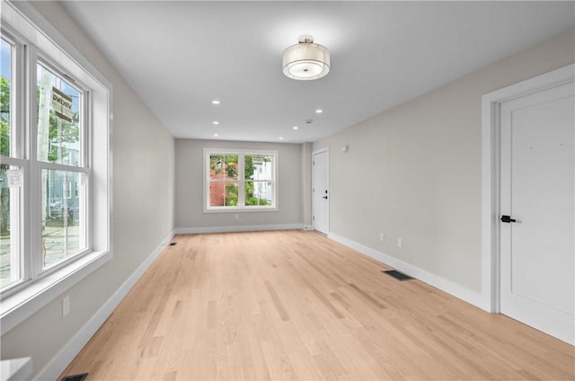 137 Stanwood St, Providence, RI 02907 - unfurnished room with light wood-type flooring and recessed lighting