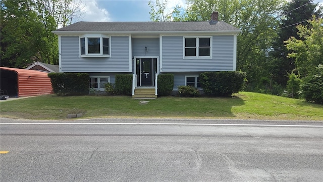 79 Cucumber Hill Rd, Foster, RI 02825 - raised ranch with a chimney and a front yard