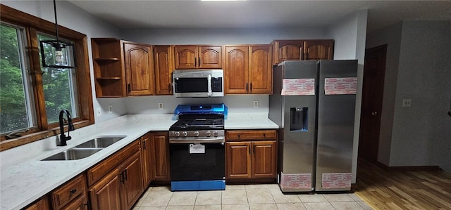 79 Cucumber Hill Rd, Foster, RI 02825 - kitchen featuring appliances with stainless steel finishes, light countertops, and brown cabinets