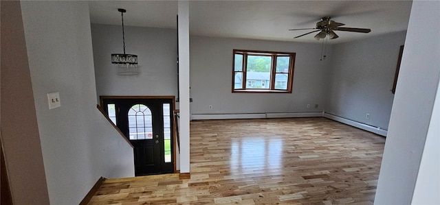 79 Cucumber Hill Rd, Foster, RI 02825 - foyer featuring wood finished floors, a ceiling fan, and baseboard heating