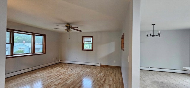 79 Cucumber Hill Rd, Foster, RI 02825 - unfurnished room featuring a baseboard radiator, a chandelier, wood finished floors, and a ceiling fan