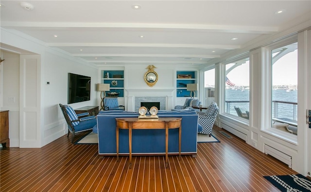 19 Defenders Row Unit 19, Newport, RI 02840 - living area with a fireplace, beamed ceiling, wood finished floors, and built in shelves