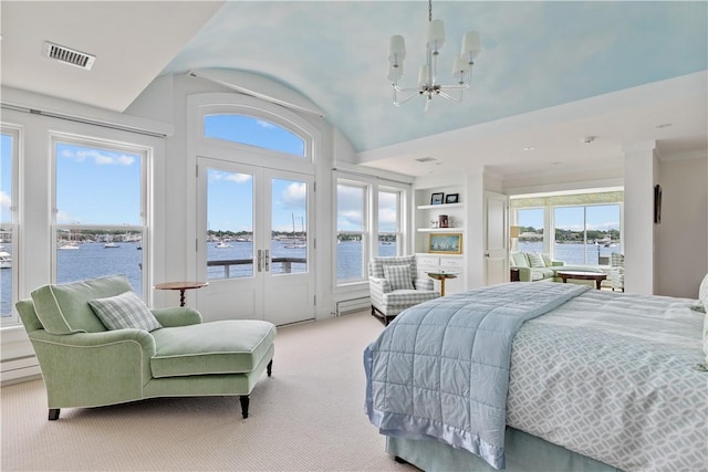 19 Defenders Row Unit 19, Newport, RI 02840 - carpeted bedroom with a chandelier, access to outside, a water view, french doors, and vaulted ceiling