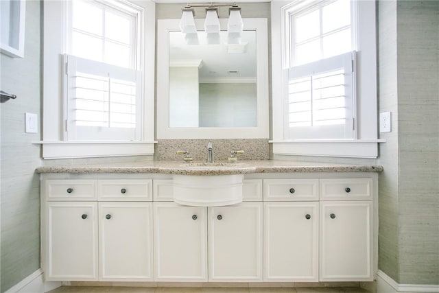 19 Defenders Row Unit 19, Newport, RI 02840 - bathroom featuring healthy amount of natural light, vanity, and ornamental molding