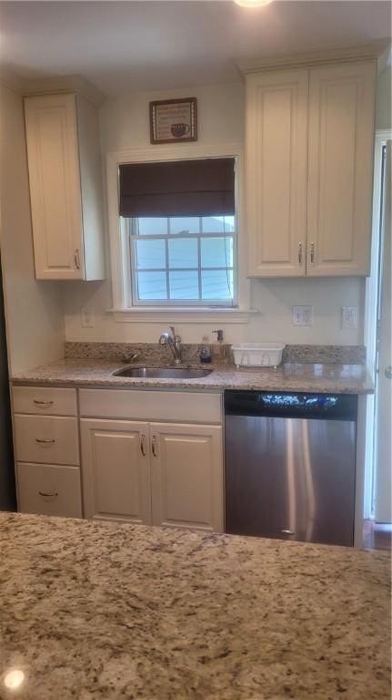 318 Corey Ln Unit 318, Middletown, RI 02842 - kitchen with stainless steel dishwasher, white cabinets, and light stone counters