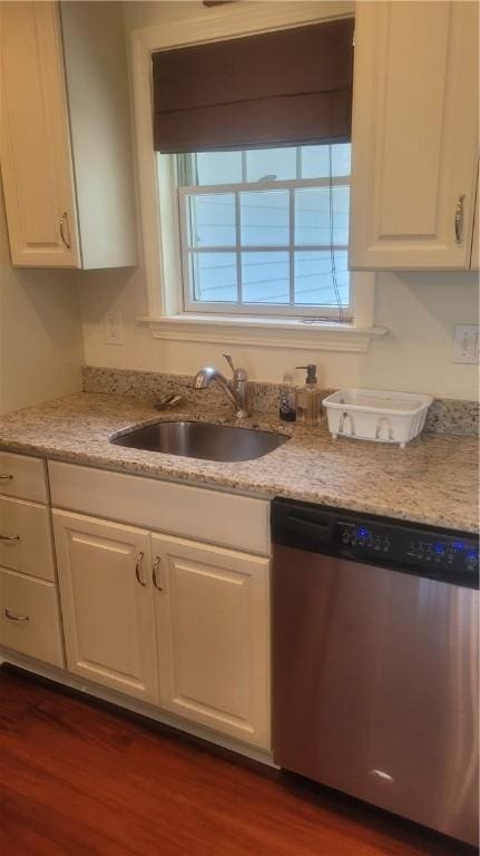 318 Corey Ln Unit 318, Middletown, RI 02842 - kitchen with stainless steel dishwasher, white cabinets, and dark wood-type flooring
