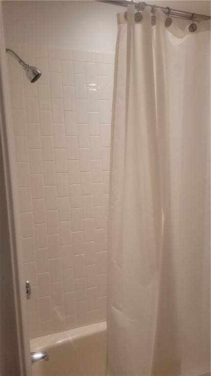 318 Corey Ln Unit 318, Middletown, RI 02842 - bathroom featuring shower / bath combo with shower curtain