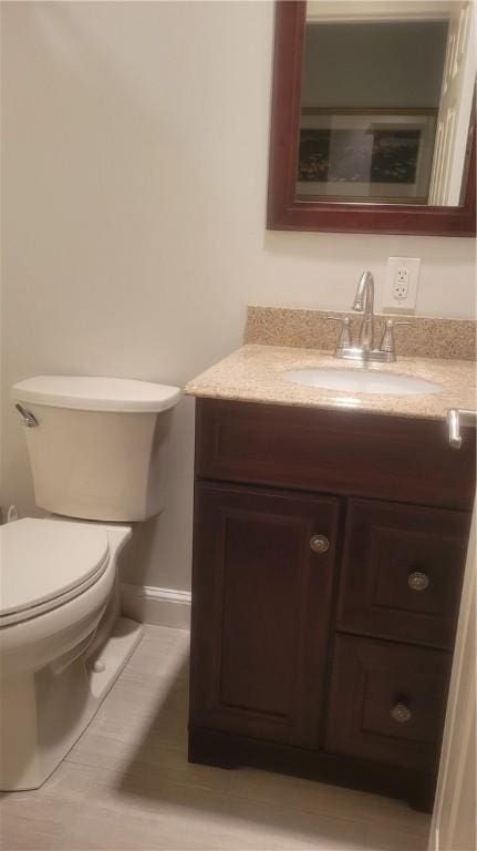 318 Corey Ln Unit 318, Middletown, RI 02842 - half bathroom with vanity and toilet