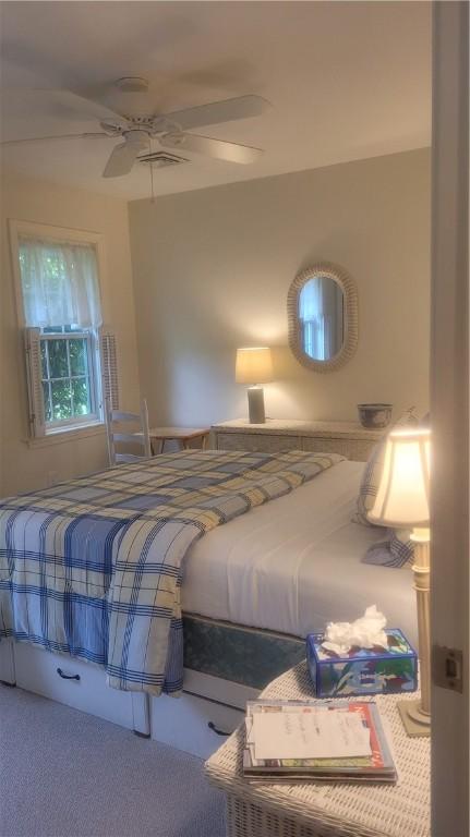 318 Corey Ln Unit 318, Middletown, RI 02842 - bedroom with a ceiling fan and carpet flooring