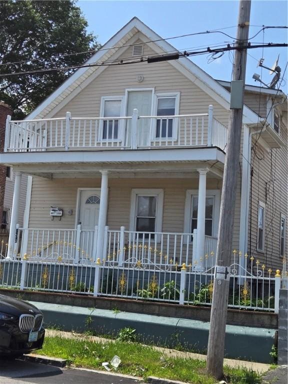 133 Byfield St, Providence, RI 02905 - view of front of property with a balcony and covered porch