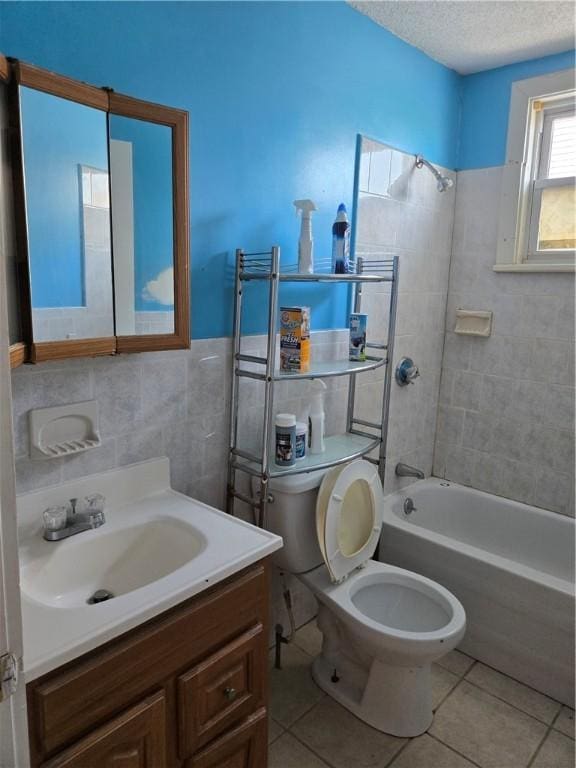 133 Byfield St, Providence, RI 02905 - full bath featuring tile walls, vanity, a textured ceiling, tile patterned flooring, and shower / washtub combination