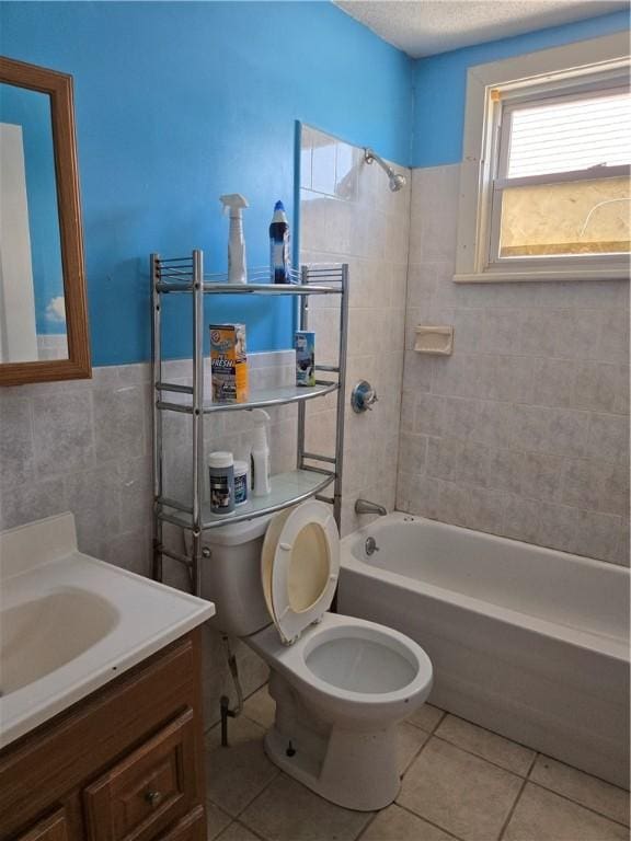 133 Byfield St, Providence, RI 02905 - full bath featuring tile walls, tile patterned floors, vanity, shower / bath combination, and wainscoting