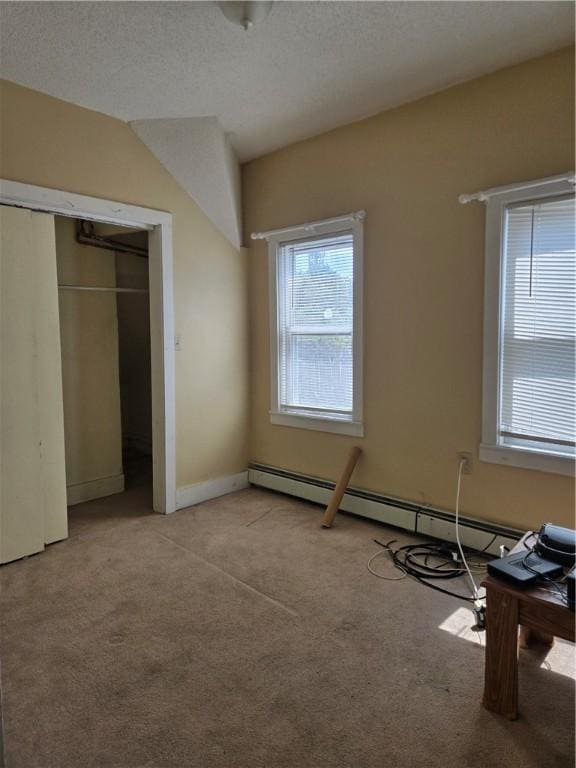 133 Byfield St, Providence, RI 02905 - unfurnished bedroom with carpet floors, multiple windows, a closet, a baseboard radiator, and a textured ceiling