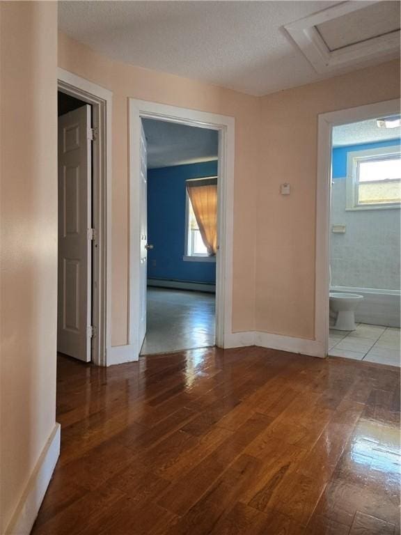 133 Byfield St, Providence, RI 02905 - hall featuring hardwood / wood-style floors, a baseboard heating unit, and attic access
