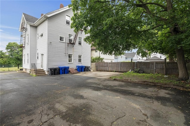 35 Fountain St, Pawtucket, RI 02860 - view of property exterior featuring a chimney