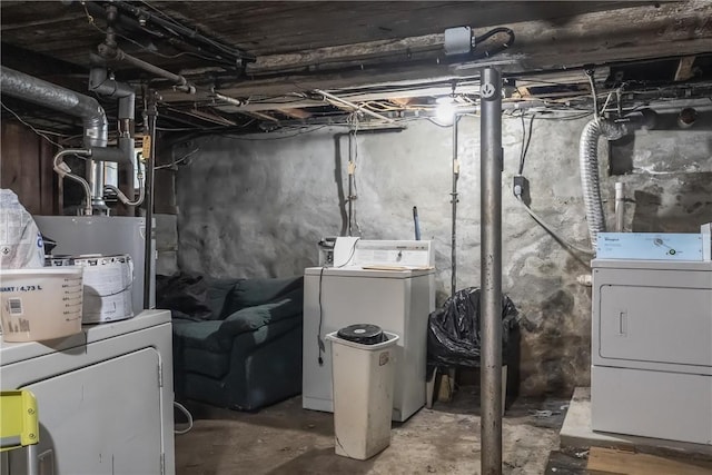 35 Fountain St, Pawtucket, RI 02860 - unfinished basement featuring washing machine and clothes dryer and electric water heater