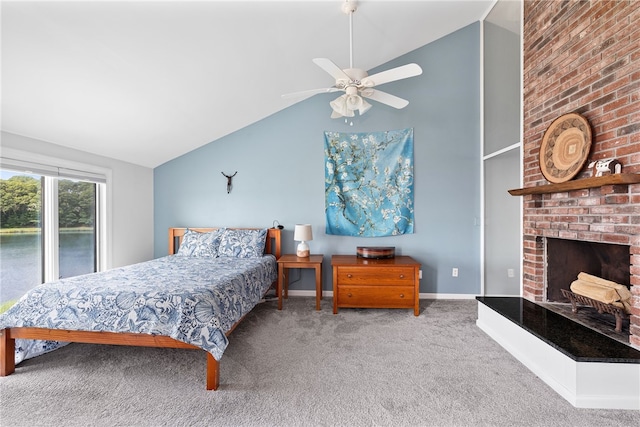 267 Fishing Cove Rd, North Kingstown, RI 02852 - carpeted bedroom featuring a fireplace, a ceiling fan, and high vaulted ceiling