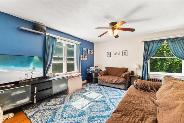 4 S Cornell Ave, Warren, RI 02885 - living room featuring plenty of natural light, a ceiling fan, and wood finished floors