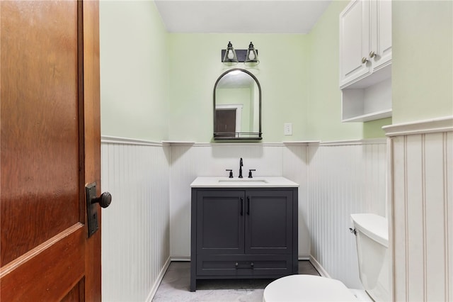 4 S Cornell Ave, Warren, RI 02885 - half bath featuring wainscoting and vanity