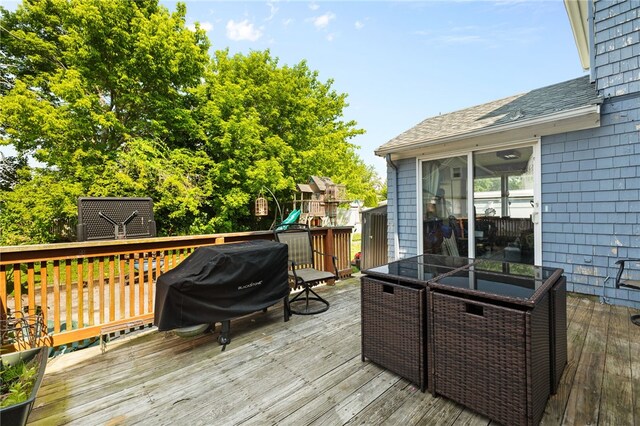 4 S Cornell Ave, Warren, RI 02885 - wooden terrace with a grill, a playground, and outdoor dining area