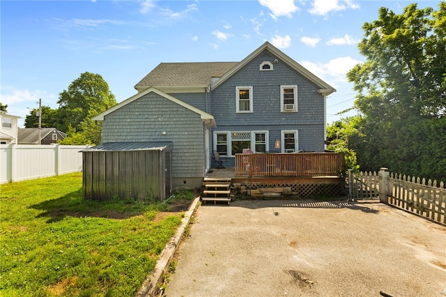 4 S Cornell Ave, Warren, RI 02885 - back of house with a wooden deck and a fenced backyard