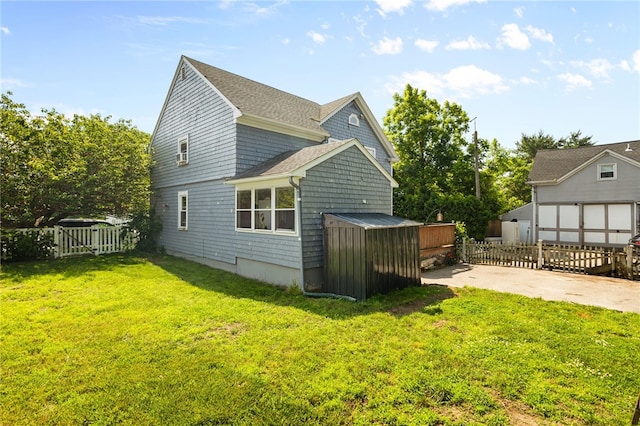 4 S Cornell Ave, Warren, RI 02885 - back of property featuring a storage shed
