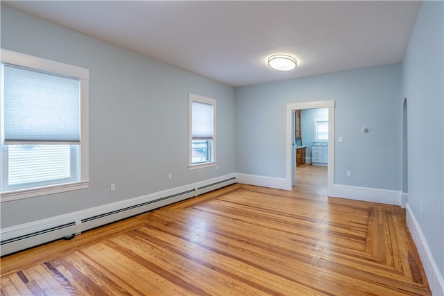 168 Waterman Ave, East Providence, RI 02914 - spare room featuring baseboard heating and light wood-type flooring