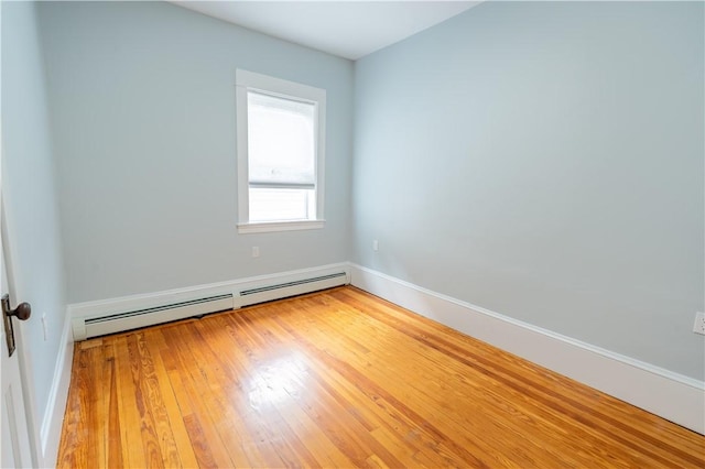 168 Waterman Ave, East Providence, RI 02914 - unfurnished room with baseboard heating and hardwood / wood-style flooring