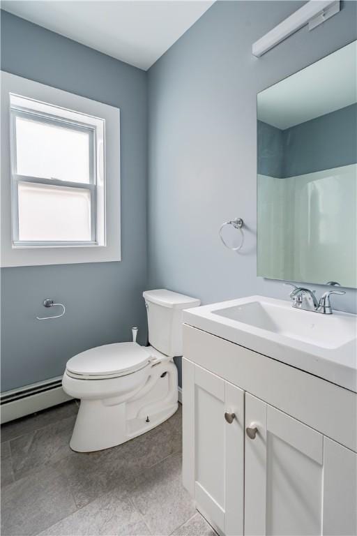 168 Waterman Ave, East Providence, RI 02914 - bathroom featuring a baseboard heating unit and vanity