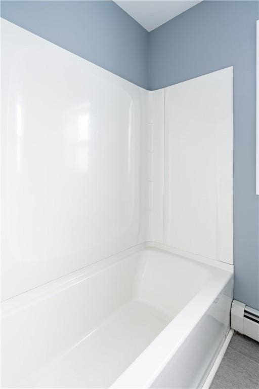 168 Waterman Ave, East Providence, RI 02914 - full bathroom featuring a baseboard heating unit, a tub to relax in, and a shower