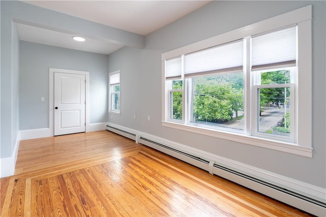168 Waterman Ave, East Providence, RI 02914 - unfurnished room featuring a baseboard radiator and light wood finished floors