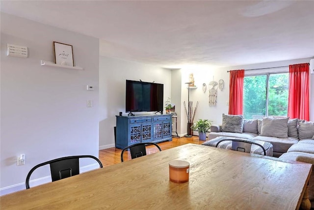 25 Sharon St Unit 1, Cranston, RI 02910 - living area featuring baseboards and light wood-style floors