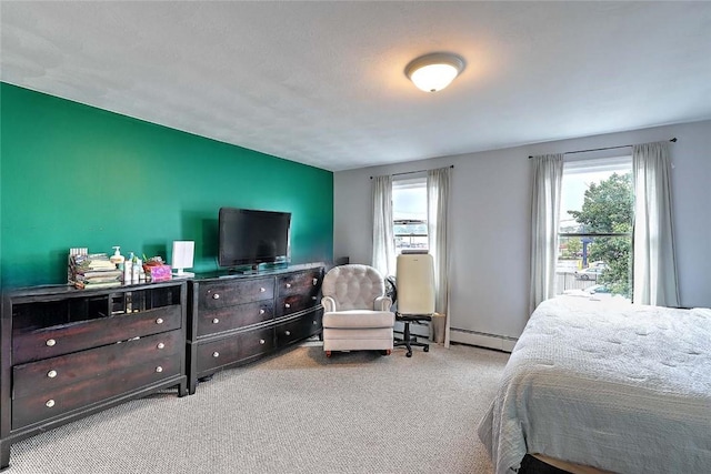 25 Sharon St Unit 1, Cranston, RI 02910 - bedroom with a baseboard radiator and carpet floors