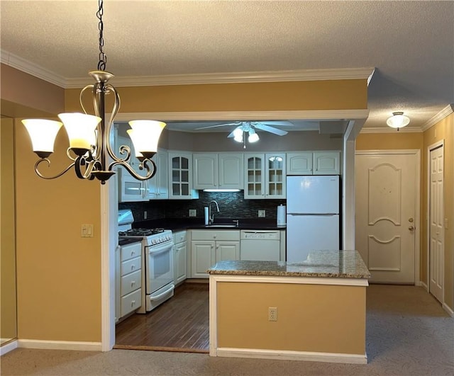 200 Hoffman Ave Unit 206, Cranston, RI 02920 - kitchen with white appliances, a textured ceiling, glass insert cabinets, hanging light fixtures, and ornamental molding