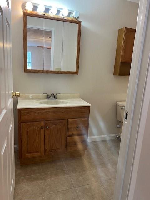 444 Woodward Rd Unit 3, North Providence, RI 02904 - half bathroom with vanity and tile patterned floors