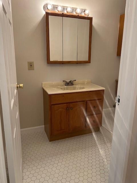 444 Woodward Rd Unit 3, North Providence, RI 02904 - bathroom featuring vanity and baseboards