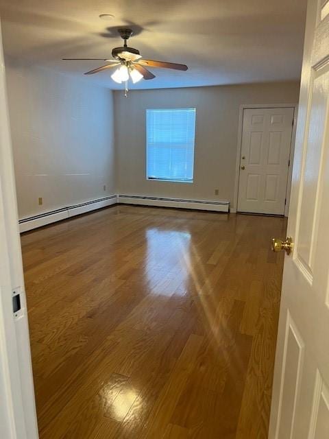 444 Woodward Rd Unit 3, North Providence, RI 02904 - unfurnished room featuring baseboard heating, wood finished floors, ceiling fan, and a baseboard radiator