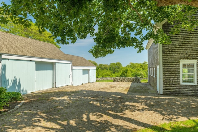68 Grange Ave, Little Compton, RI 02837 - view of yard featuring an outbuilding and a detached garage