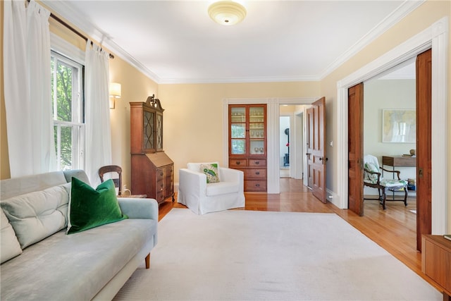 68 Grange Ave, Little Compton, RI 02837 - living room with wood finished floors and crown molding