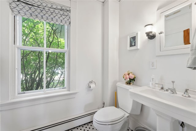 68 Grange Ave, Little Compton, RI 02837 - half bath with a baseboard radiator and healthy amount of natural light
