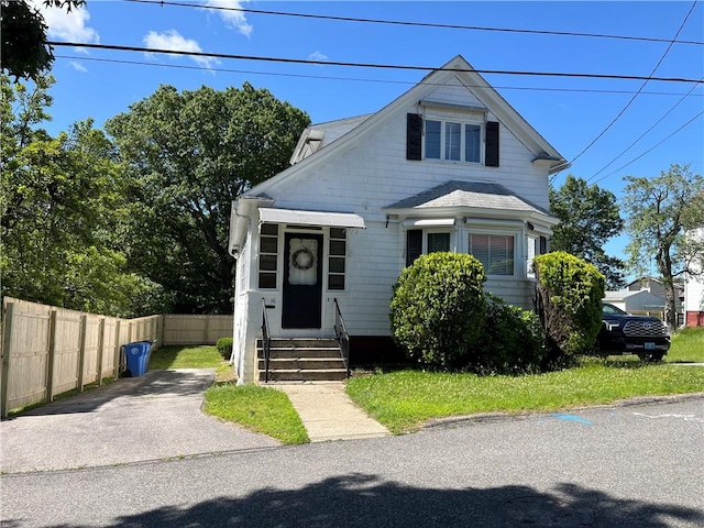 16 Winthrop St, Cranston, RI 02910 - view of front of house with entry steps and driveway
