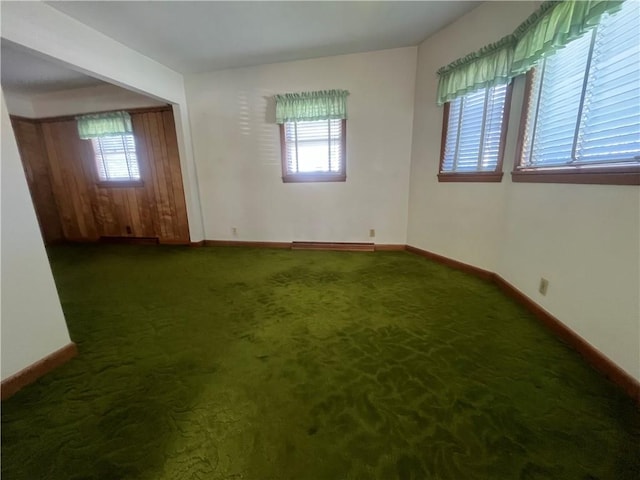 16 Winthrop St, Cranston, RI 02910 - empty room with baseboards and carpet floors