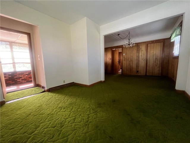 16 Winthrop St, Cranston, RI 02910 - empty room featuring a chandelier and dark carpet