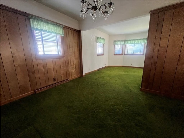 16 Winthrop St, Cranston, RI 02910 - carpeted spare room with a chandelier and wood walls